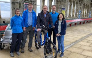 The Morecambe Bay Partnership team with MP for Westmorland and Lonsdale Tim Farron at Grange Station