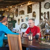 Two people relaxing at Pattys Barn Wildey Media