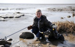 Young beach clean volunteer