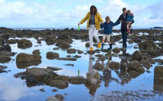 Family enjoying Half Moon Bay Wildey Media